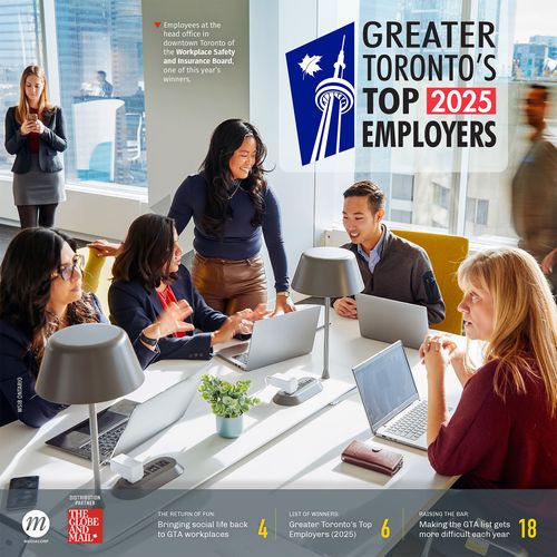 Employees collaborating at the head office of the Workplace Safety and Insurance Board in downtown Toronto, featured as one of Greater Toronto's Top Employers for 2025. The image showcases a modern workspace with natural light, diverse team members working together, and laptops on the table.